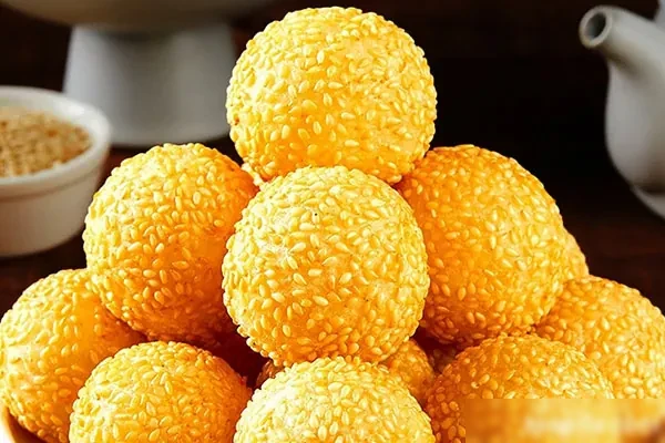 空心大芝麻球详细手法教学-小吃方略网